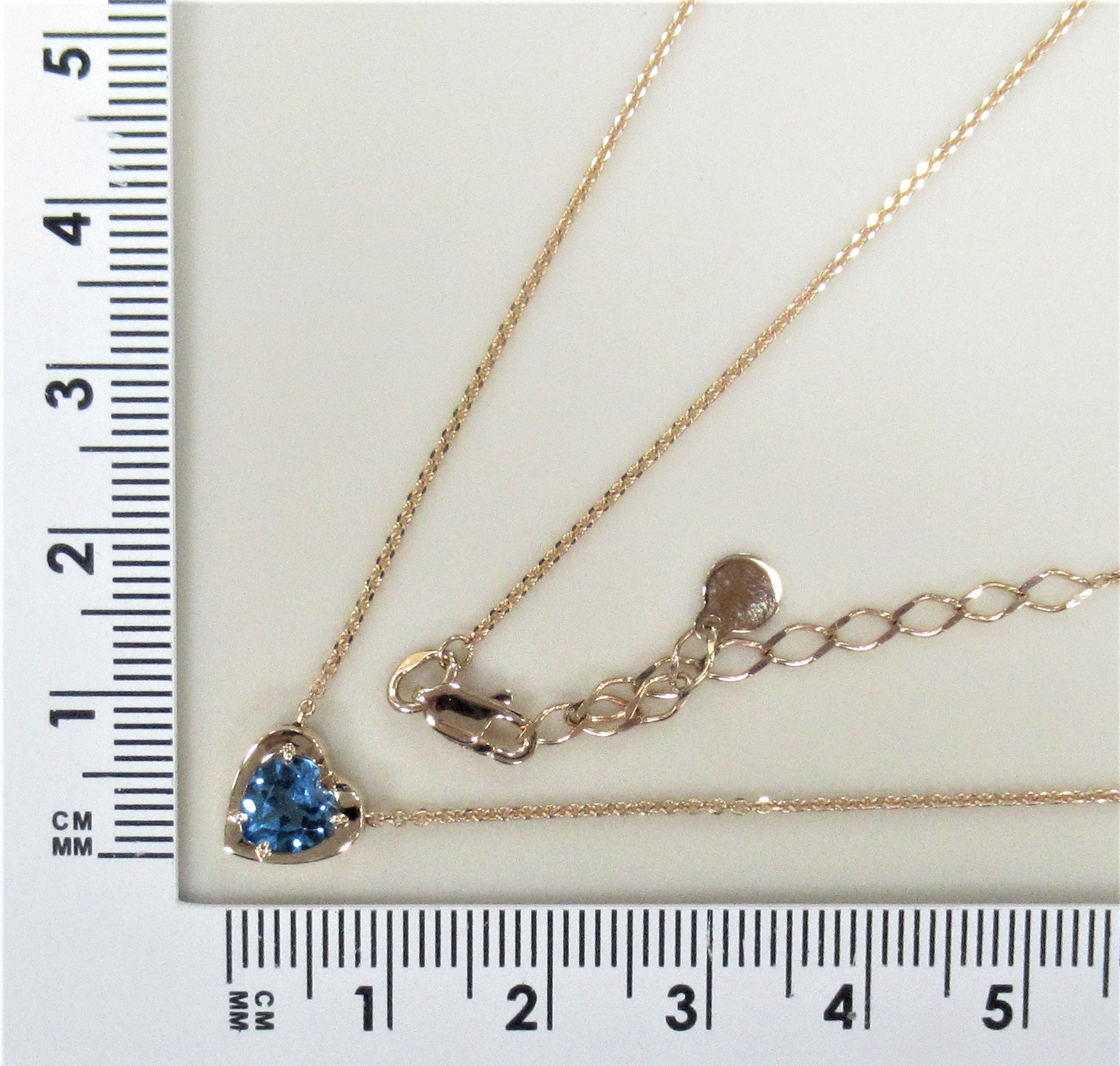 Колье из золота с топазом Свисс "Сердце"